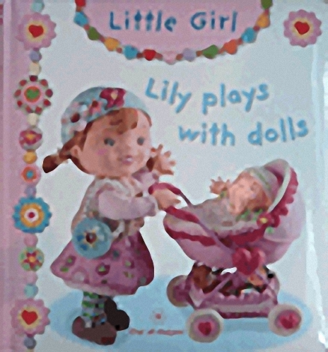 Lily plays with dolla